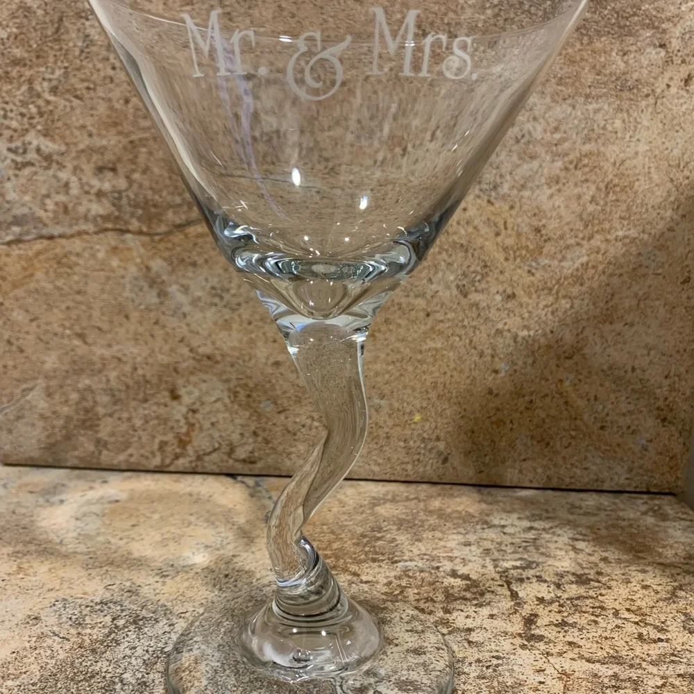Mr. & Mrs. toasting glasses